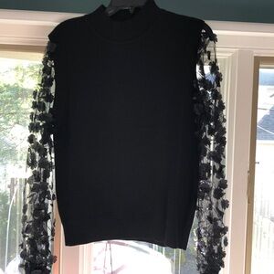 Fun sheer sleeve black top
